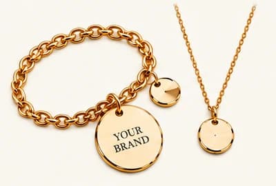 Gold bracelet and necklace with branded coin charms.